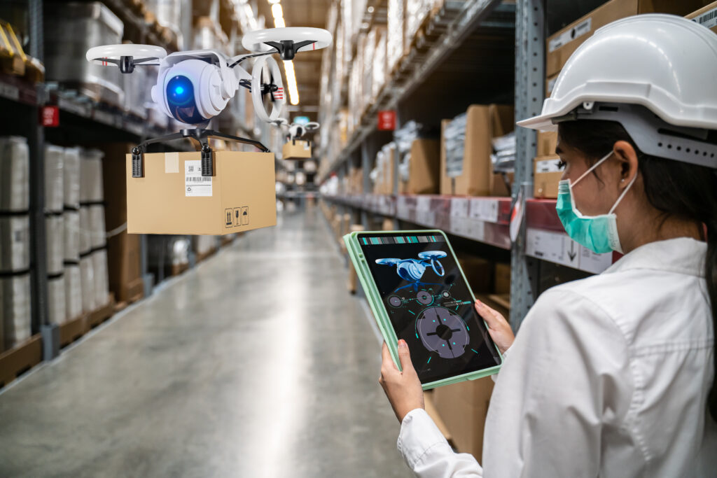 Picture of a woman controlling a drone